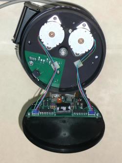 photo showing the PTZ webcam base opened with motors and circuitry