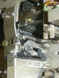 thumbnail photo of a complex mechanism, both bolts tight