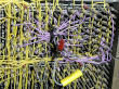 thumbnail photo of backplane with a tangle of wires, neater than original