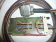 ribbon cable with compact Amphenol connector on one end and a DEC W021 circuit board on the other, component side